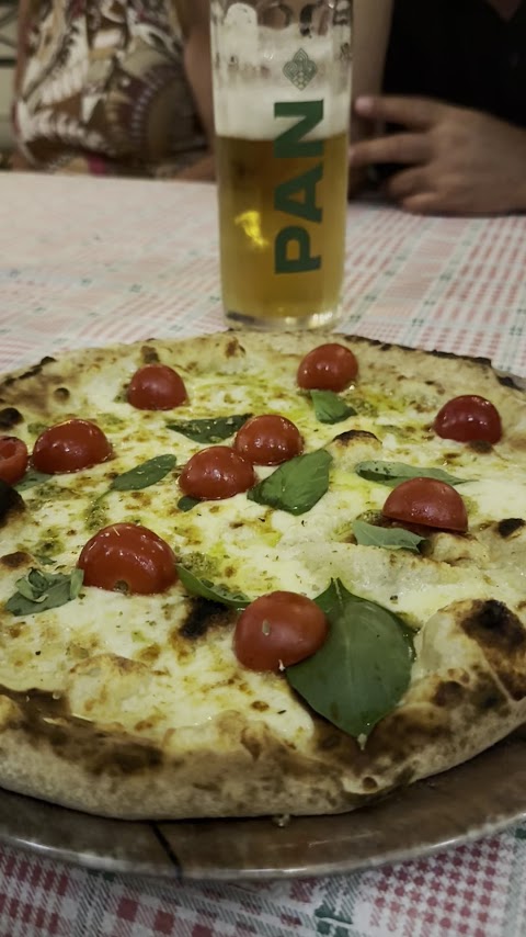 White pizza with cherry tomatoes and basil